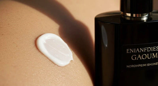 Close-up of perfumes with high sillage and longevity next to moisturizing cream for lasting scent.