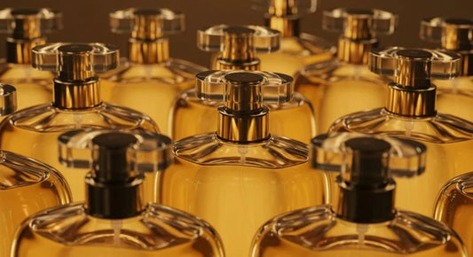 Close-up of several oriental fragrance bottles with golden accents.